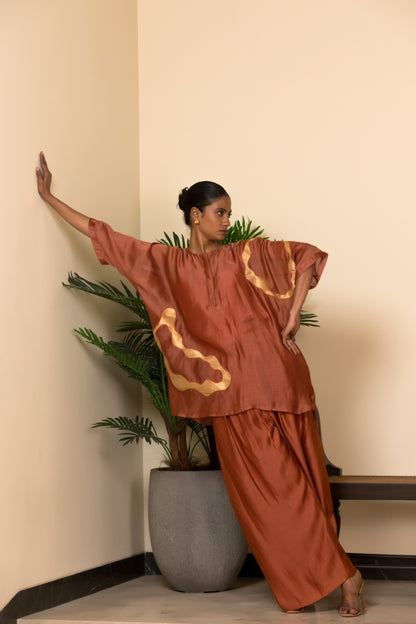 orange Banarasi shirt for women with gold detailing by indian designer Eeda