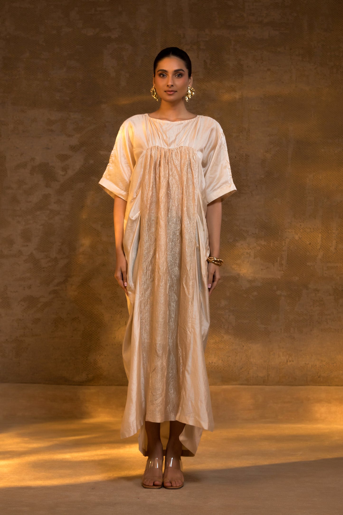 Ivory silk kaftan with crushed tissue detailing by EEDA