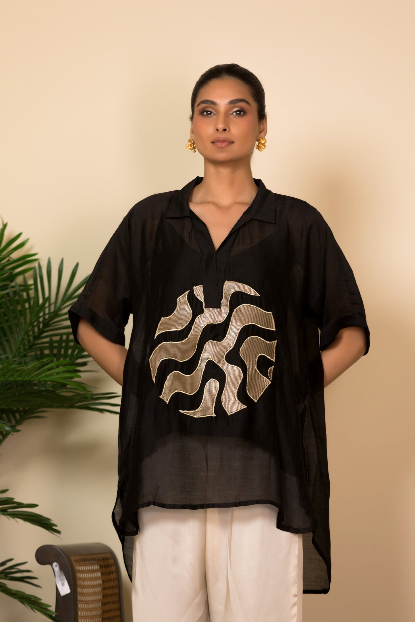 Black Banarasi silk shirt with handcrafted patchwork for women, Indian luxury designer top styled with ivory pants.