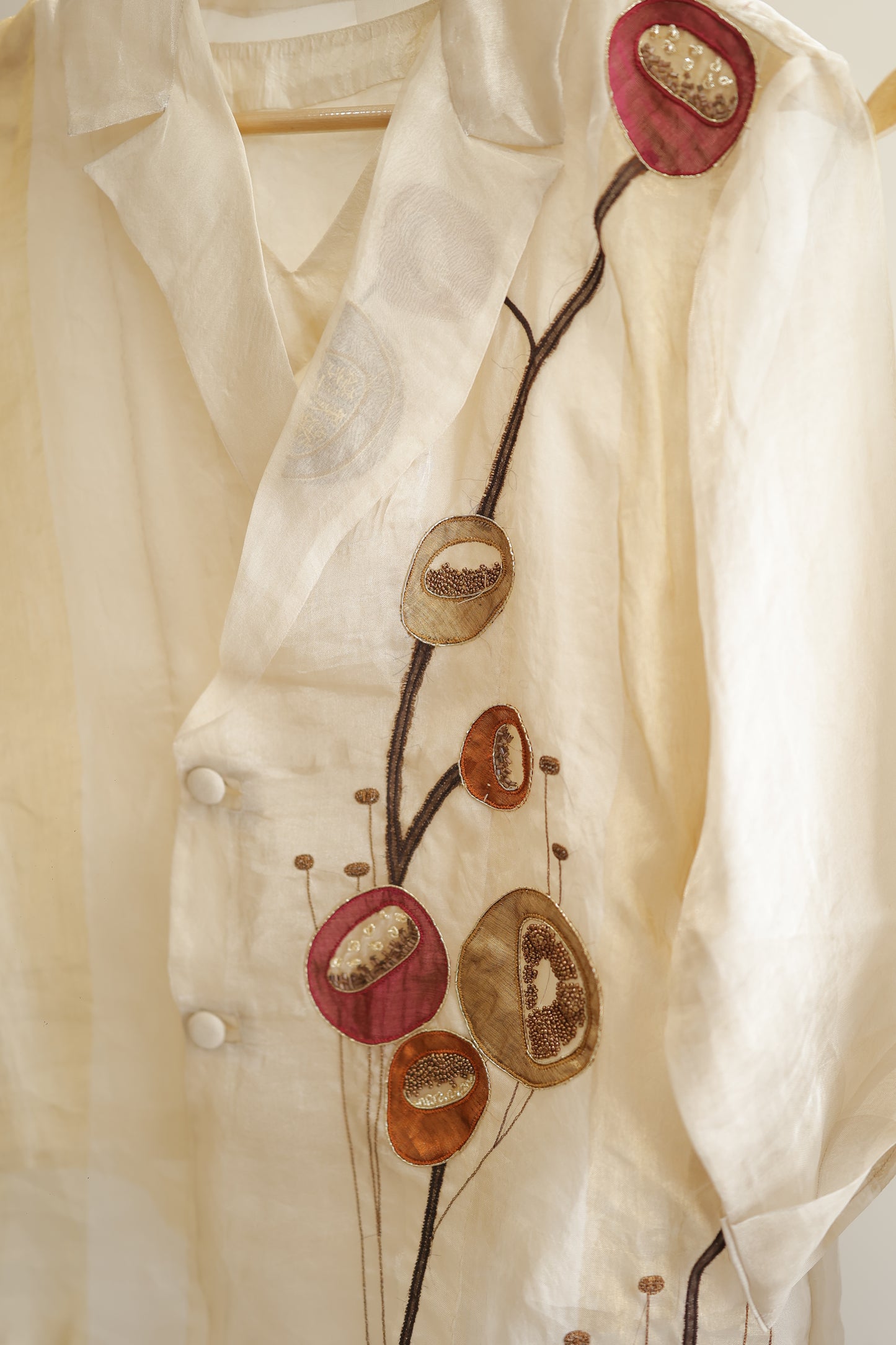 eeda ivory silk organza patchwork shirt and skirt, side view showing organza drape and silhouette