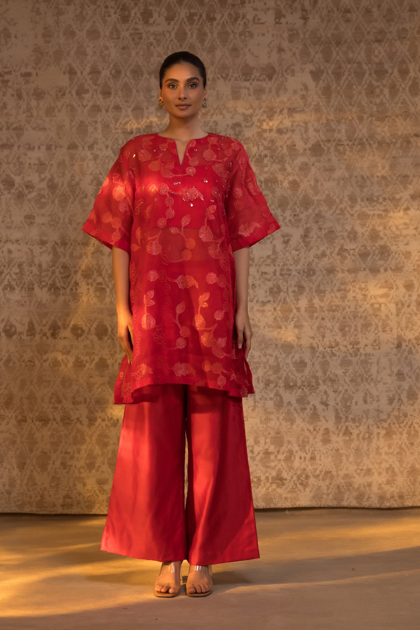 Elegant red kurta set featuring a boxy silhouette and intricate design