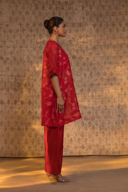 Profile view of a red organza silk kurta set with a luxurious finish