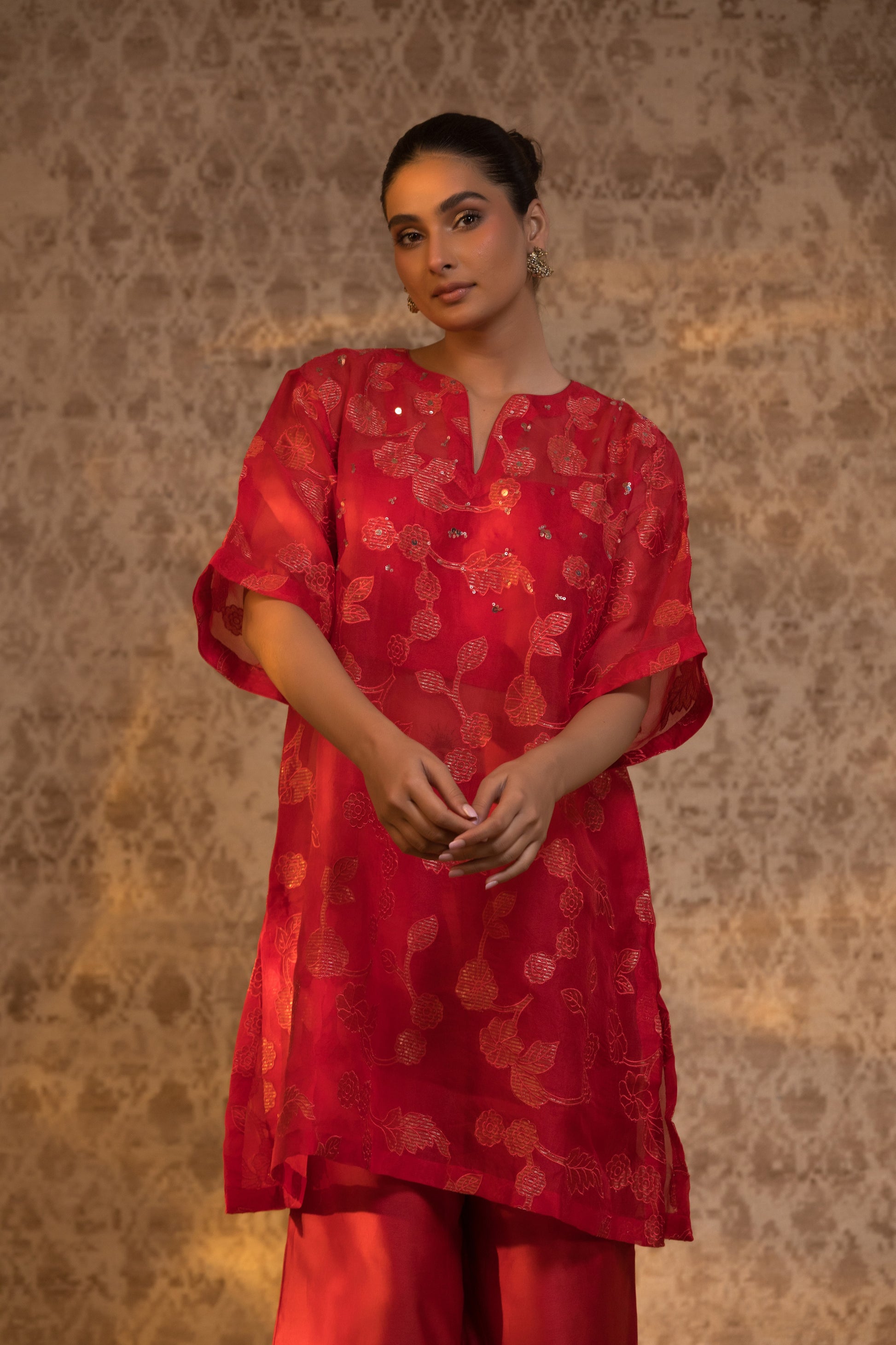 Stylish red organza kurta set with a relaxed fit and embellishments