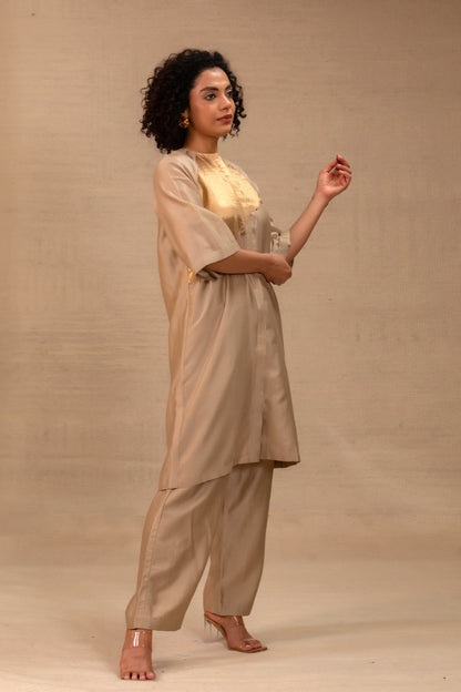 Model in a grey Chanderi kurta set with a gold tissue patch and pants — Eeda Spotlight