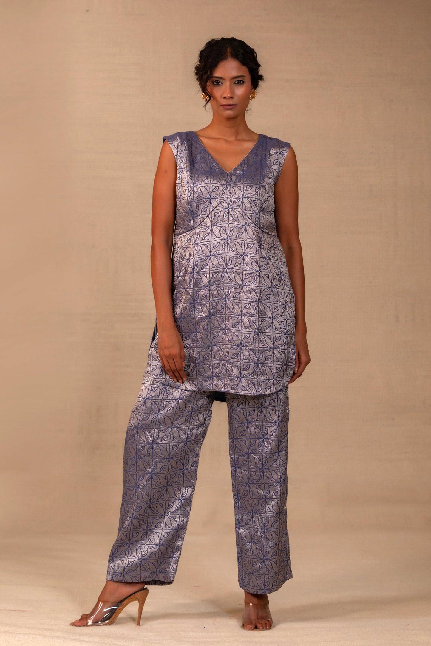 Model in a deep blue brocade co-ord set with matching pants — Eeda Kinkhab