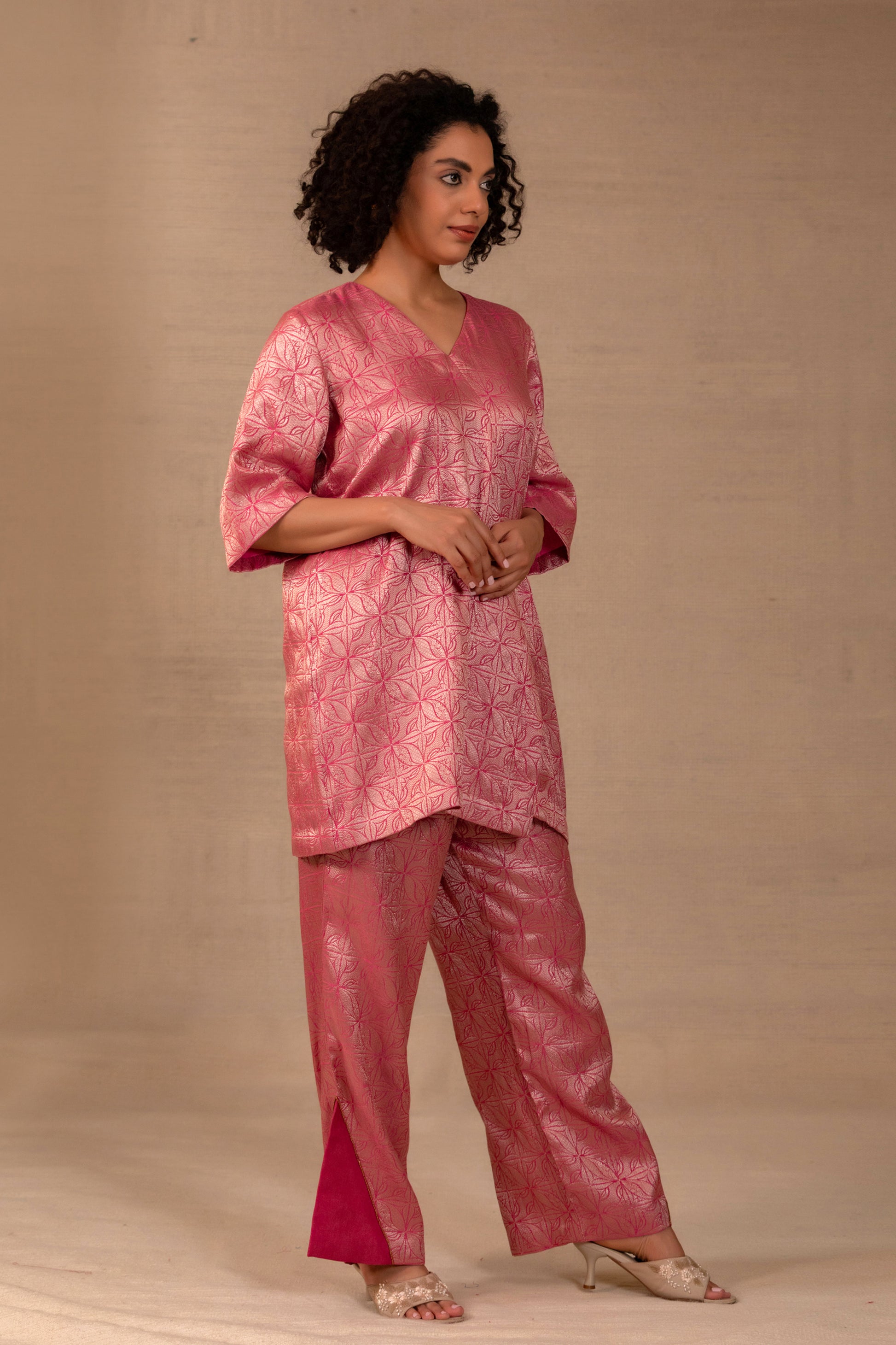Model in a pink brocade short kurta set with matching pants — Eeda Kinkhab