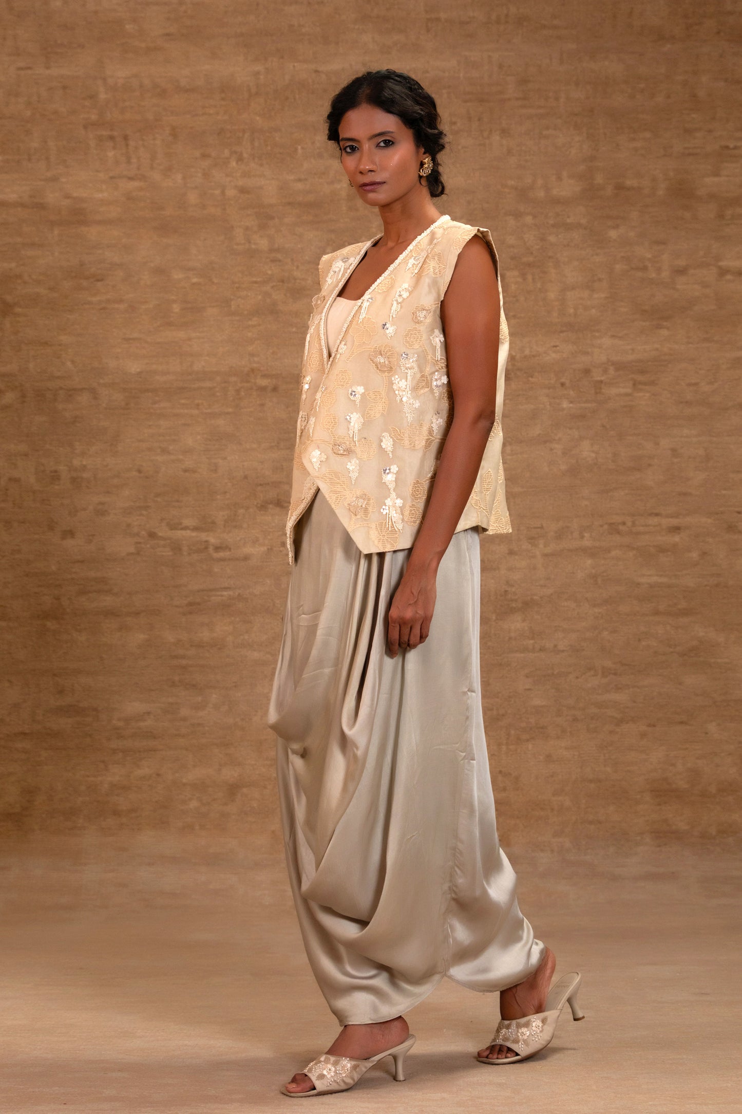 Contemporary ivory jacket and draped skirt party-wear set — Eeda Taral