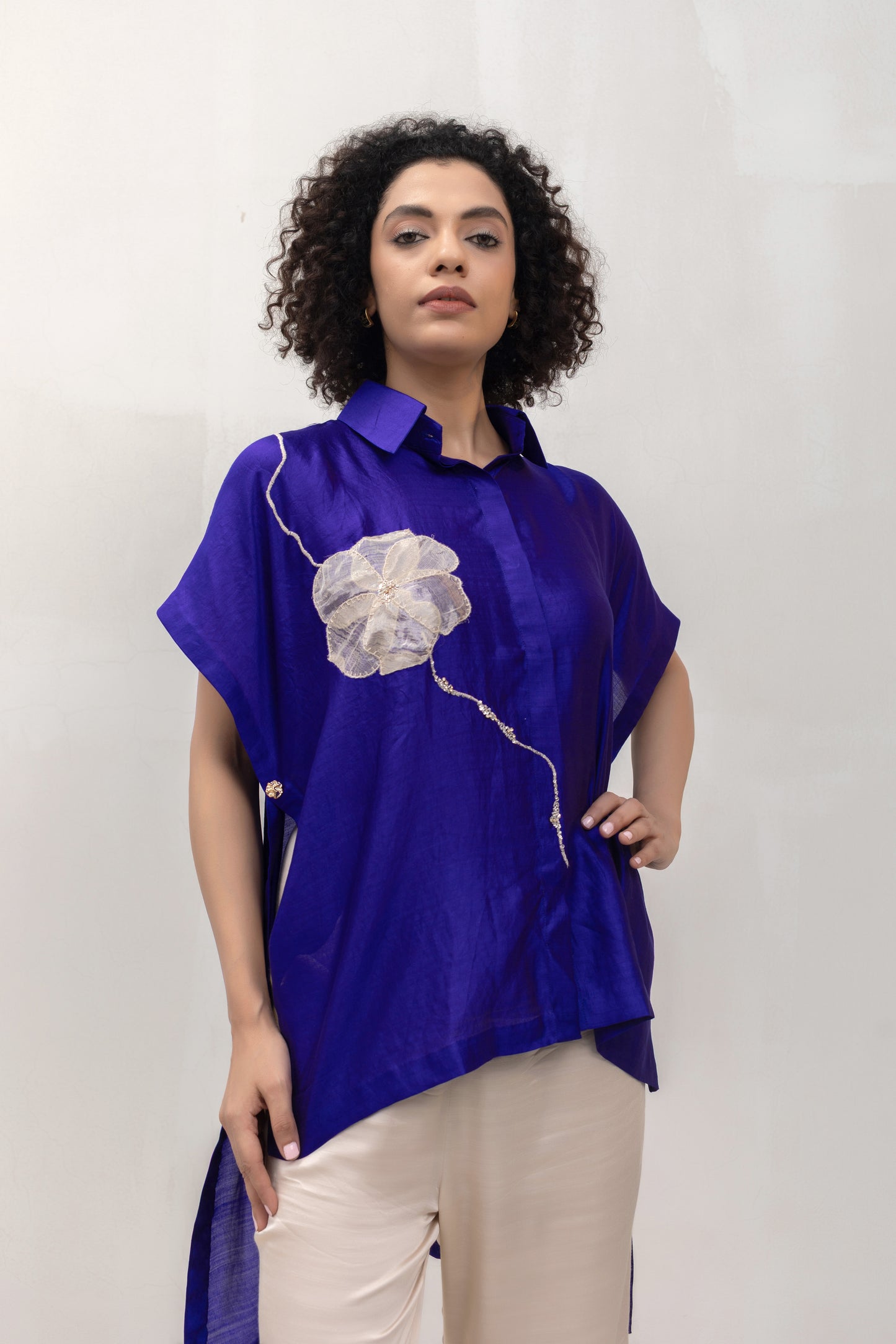 Contemporary blue silk party-wear shirt with metallic bloom appliqué — Eeda Varq