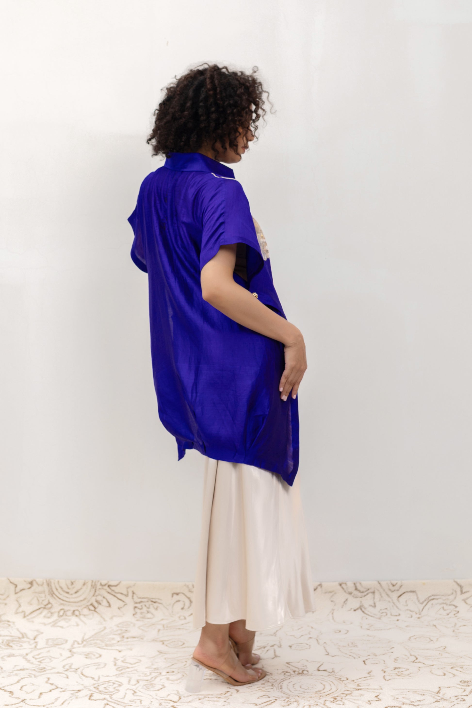 Model in a blue Varq Bloom Shirt styled with pants — Eeda