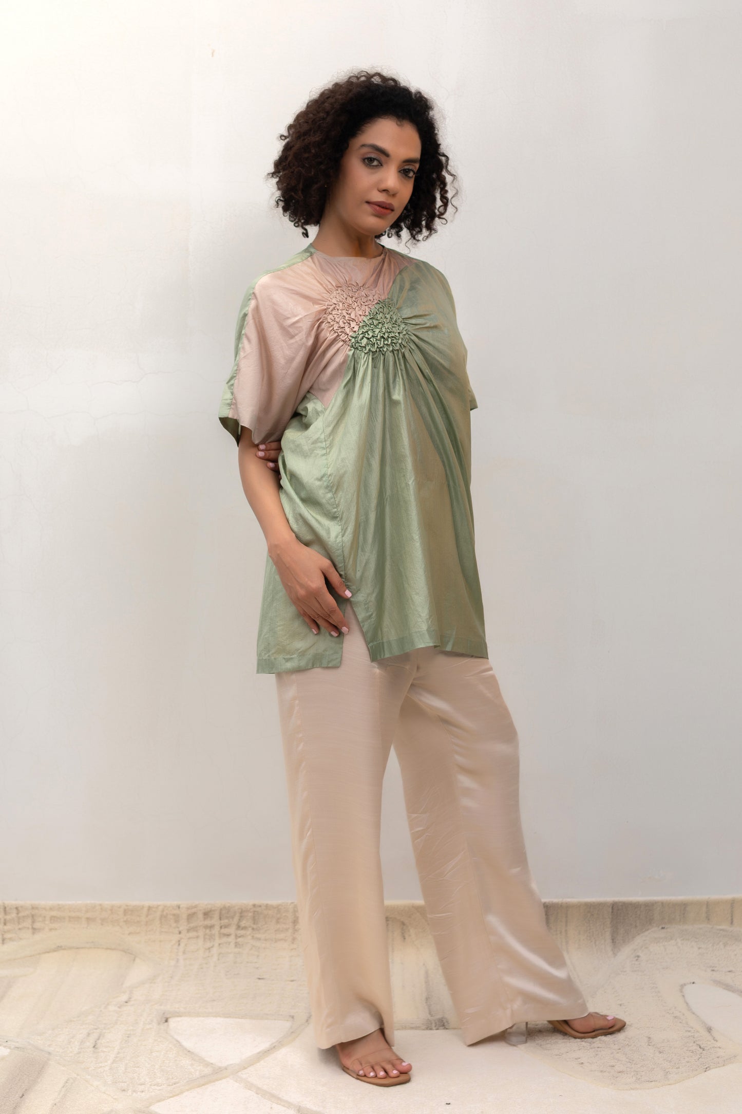 Model in a pista Varq Cluster tunic styled with pants — Eeda