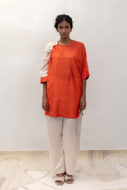 Orange silk Duet tunic with a metallic patch on one sleeve — Eeda Varq