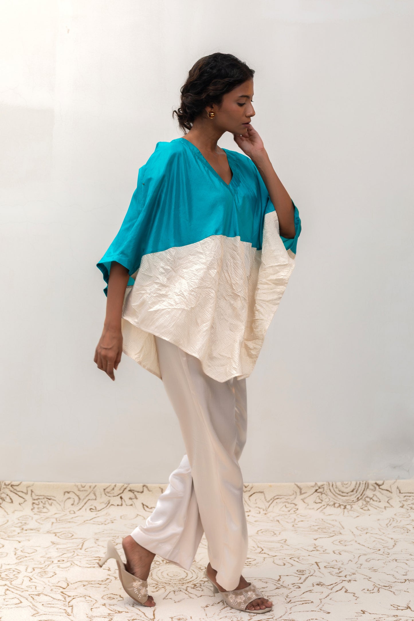 Contemporary blue colour-block top with metallic crushed-tissue texture — Eeda Varq