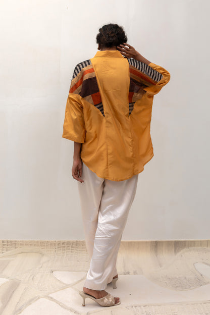 Model in a mustard Varq Mosaic shirt styled with pants — Eeda