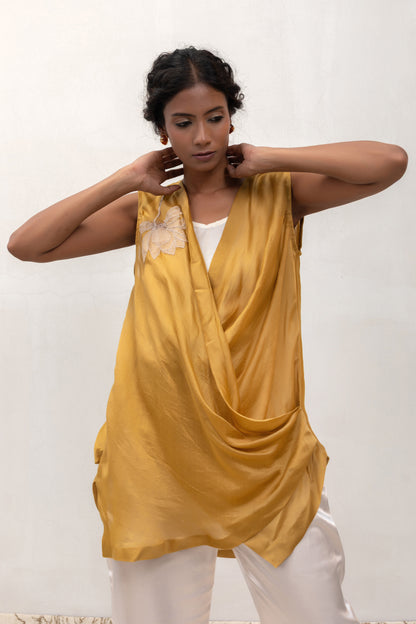 Model in a yellow Varq Petals drape top styled with pants — Eeda