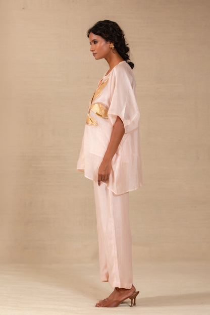Model in a Pink silk-Chanderi drop-shoulder co-ord set with gold leaf appliqué — Eeda Gulnaar