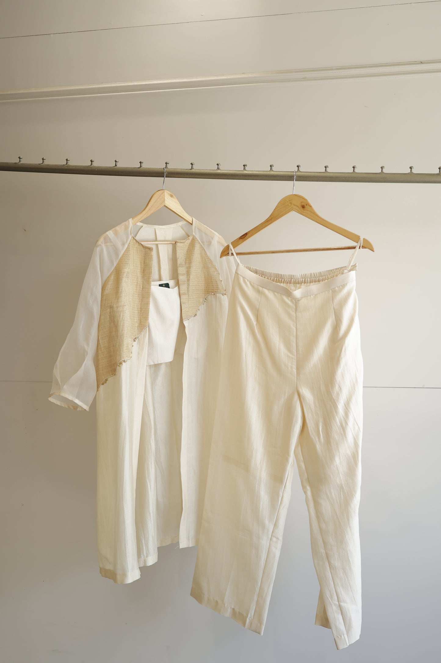 eeda ivory chanderi silk kurta with asymmetrical gold tissue patchwork panel and bishop sleeves, front view, handcrafted in Varanasi