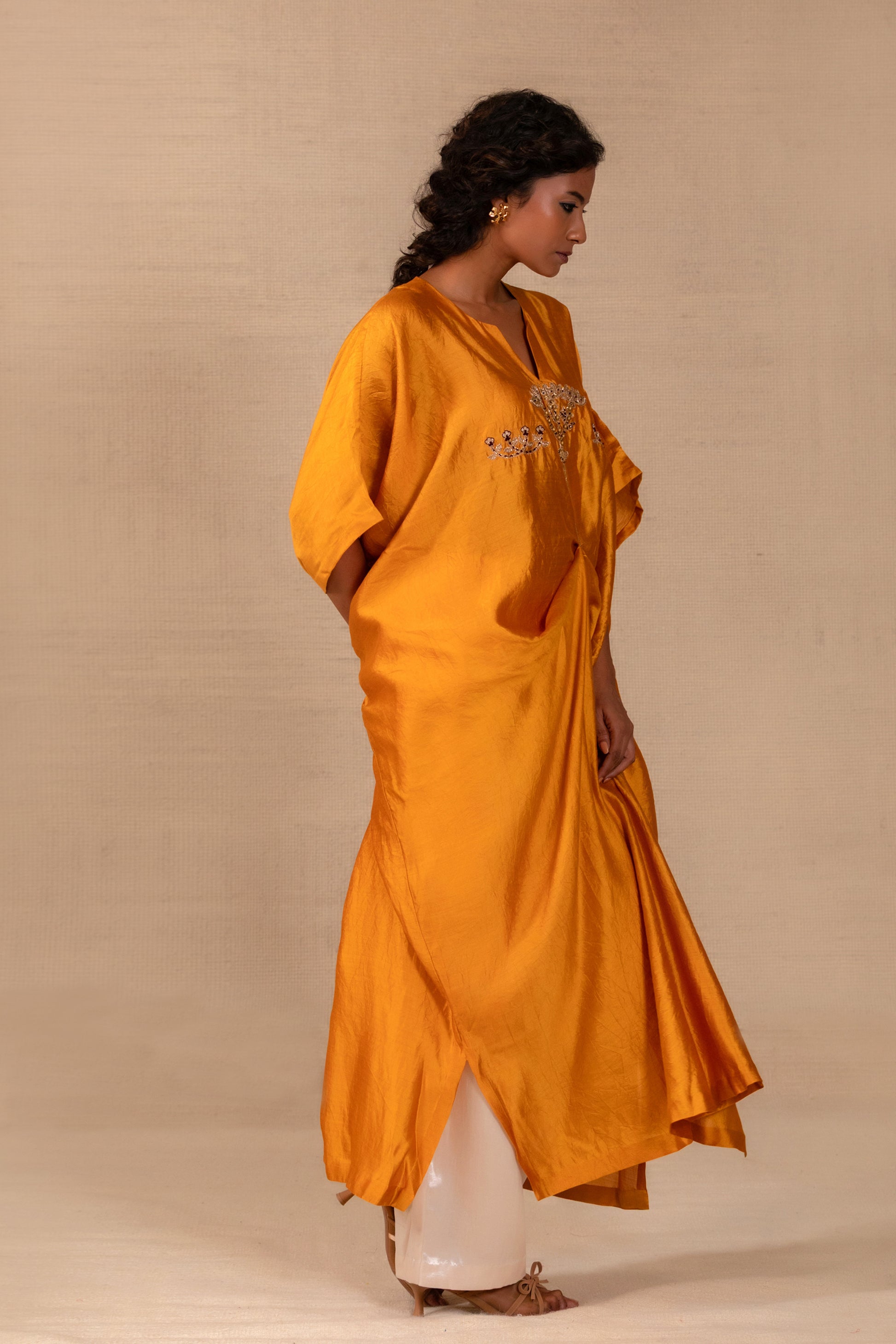 Model in a mustard folk-motif kaftan set with silk pants — Eeda Silsila
