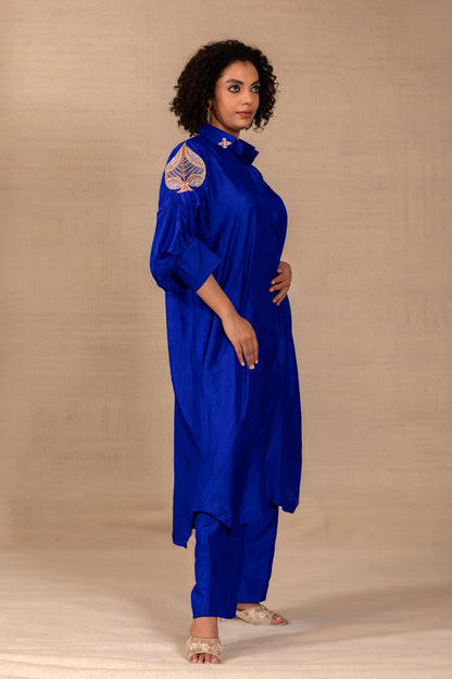 Model in a blue silk kurta set with a placed side motif and straight silk pants — Eeda Silsila