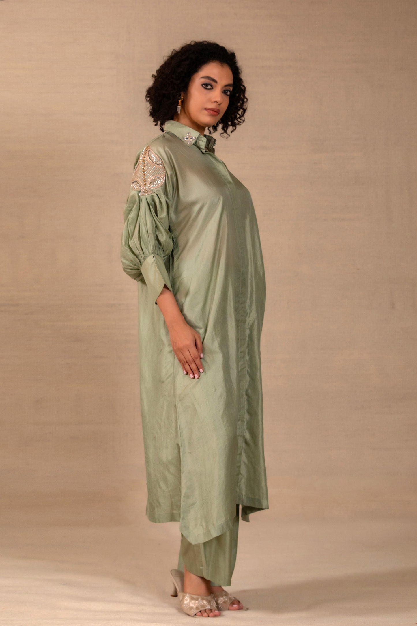 Model in a sage silk kurta set with a placed side motif and straight silk pants — Eeda Silsila