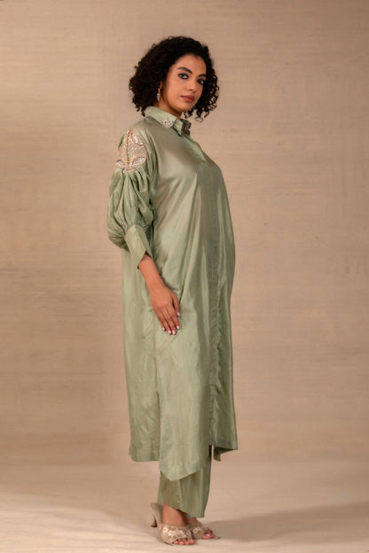 Model in a sage silk kurta set with a placed side motif and straight silk pants — Eeda Silsila